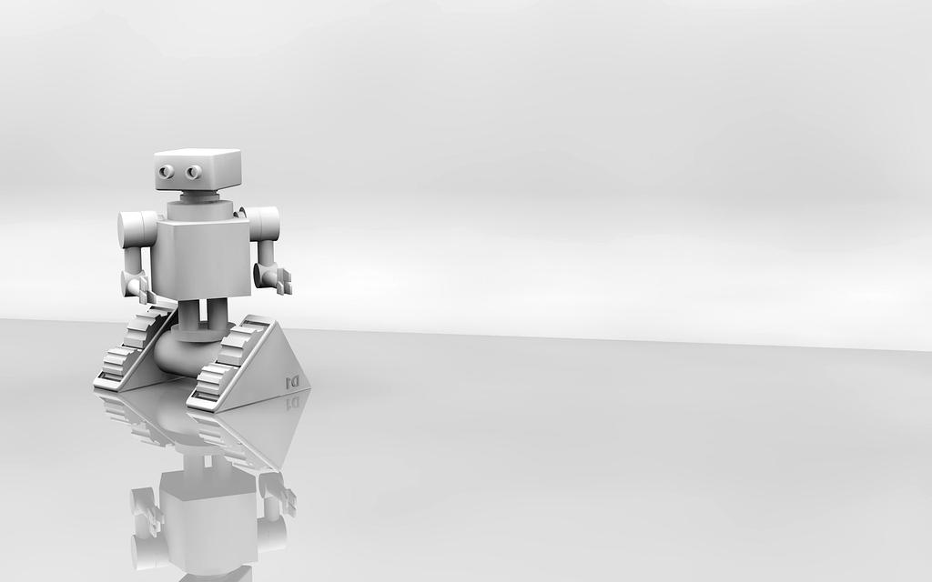 Team working on advanced robotics in a modern lab