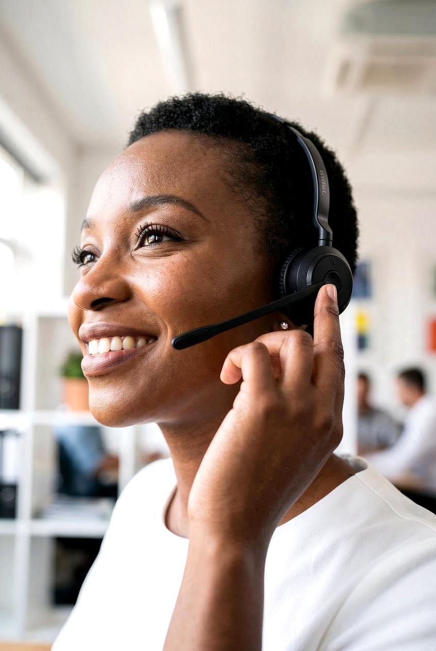 Customer support team working at desks